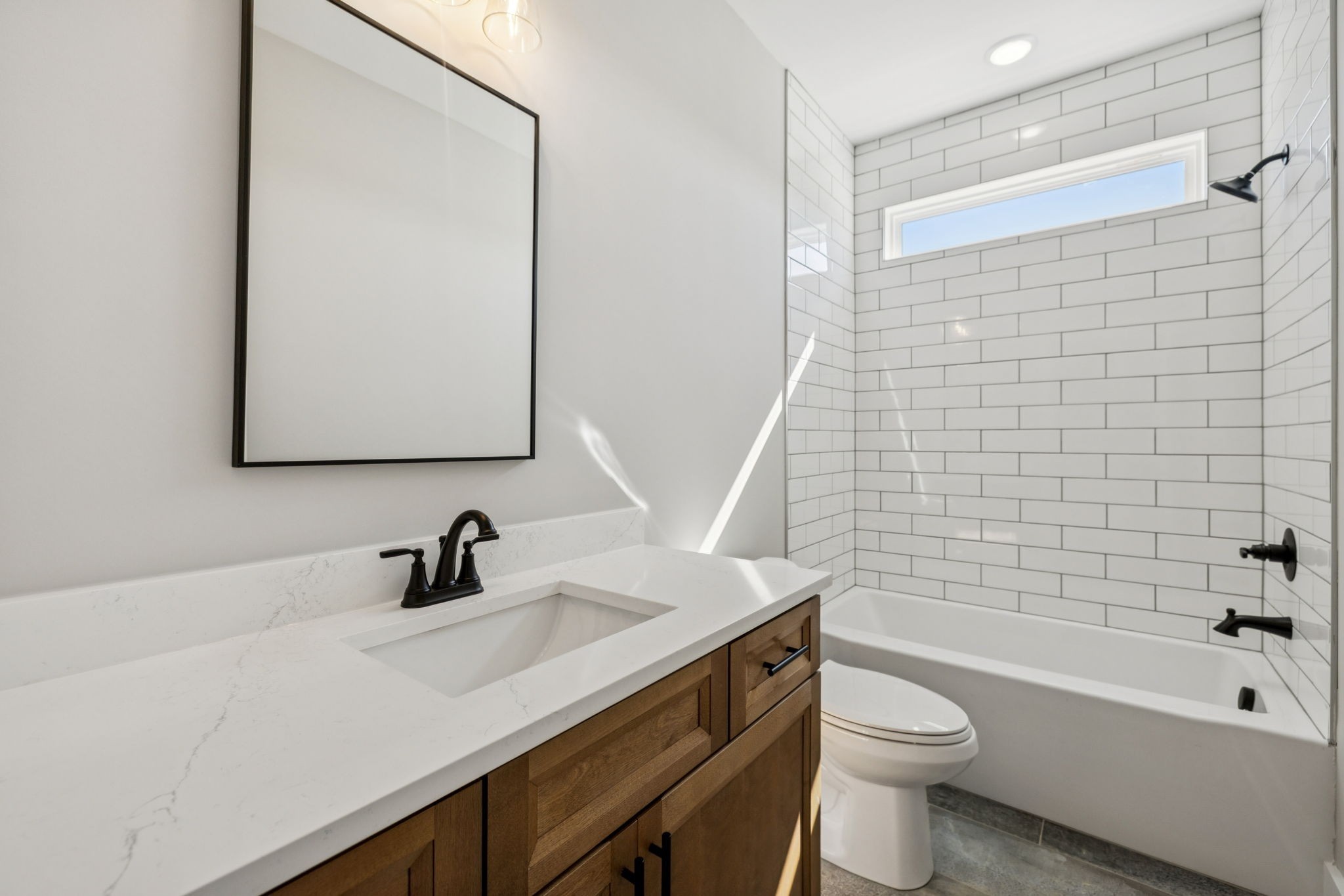 117 East Campbell Road, Unit A Madison, TN 37115 - Photo 8 of 29 a bathroom with a sink a toilet and shower