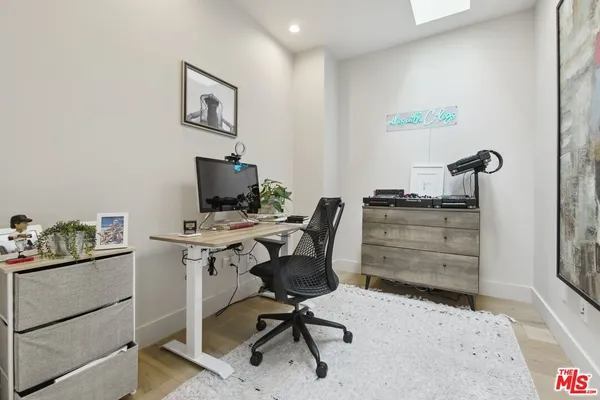 a bathroom with a toilet and a sink
