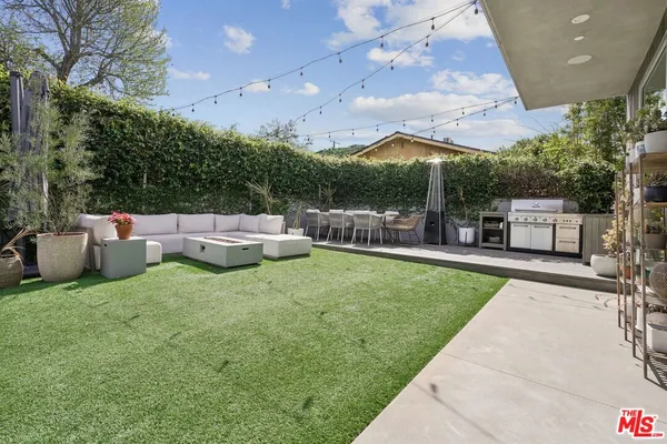 a view of an apartment with a patio