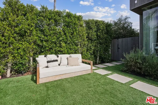 a front view of a house with garage