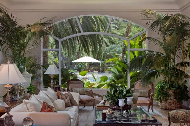 a view of a chairs and table in the patio