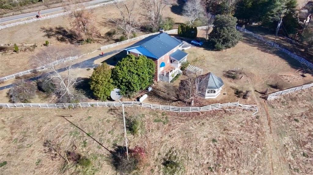 740 Patrick Mill Road Southwest Winder, GA 30680 - Photo 10 of 12 a view of a backyard with wooden fence