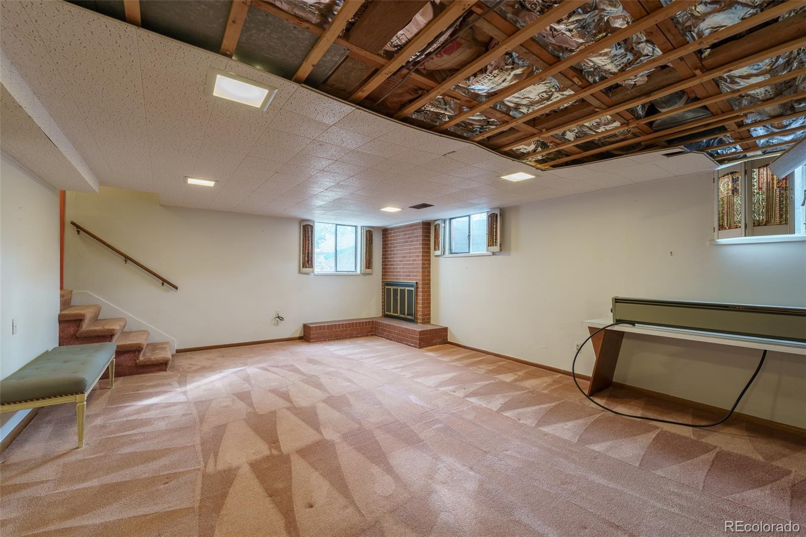 4184 Everett Drive Wheat Ridge, CO 80033 - Photo 15 of 22 a view of empty room with wooden floor