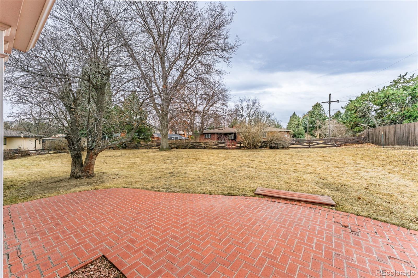 4184 Everett Drive Wheat Ridge, CO 80033 - Photo 22 of 22 a view of yard with trees