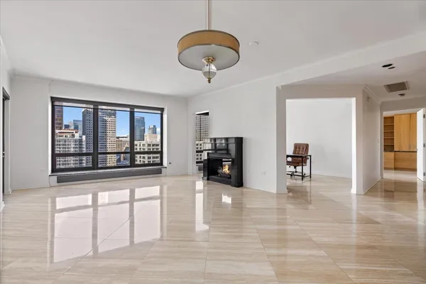 a view of a livingroom with furniture and front door