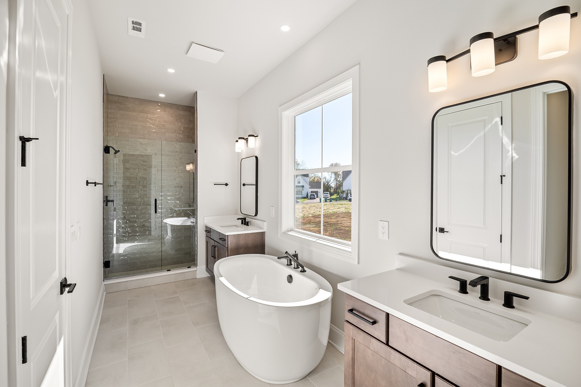1420 Round Hill Lane Spring Hill, TN 37174 - Photo 16 of 29 a bathroom with a sink a toilet and shower