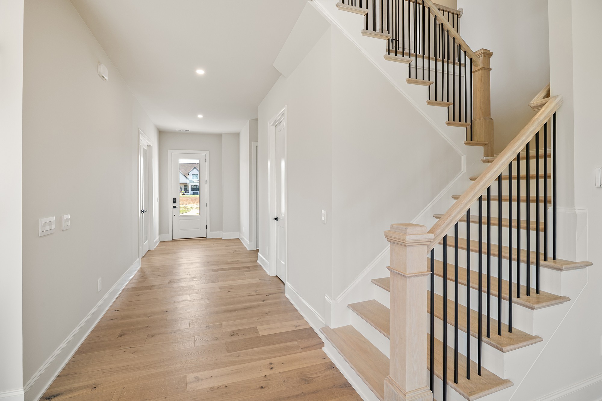 1420 Round Hill Lane Spring Hill, TN 37174 - Photo 9 of 29 a view of a hallway with wooden floor and entryway