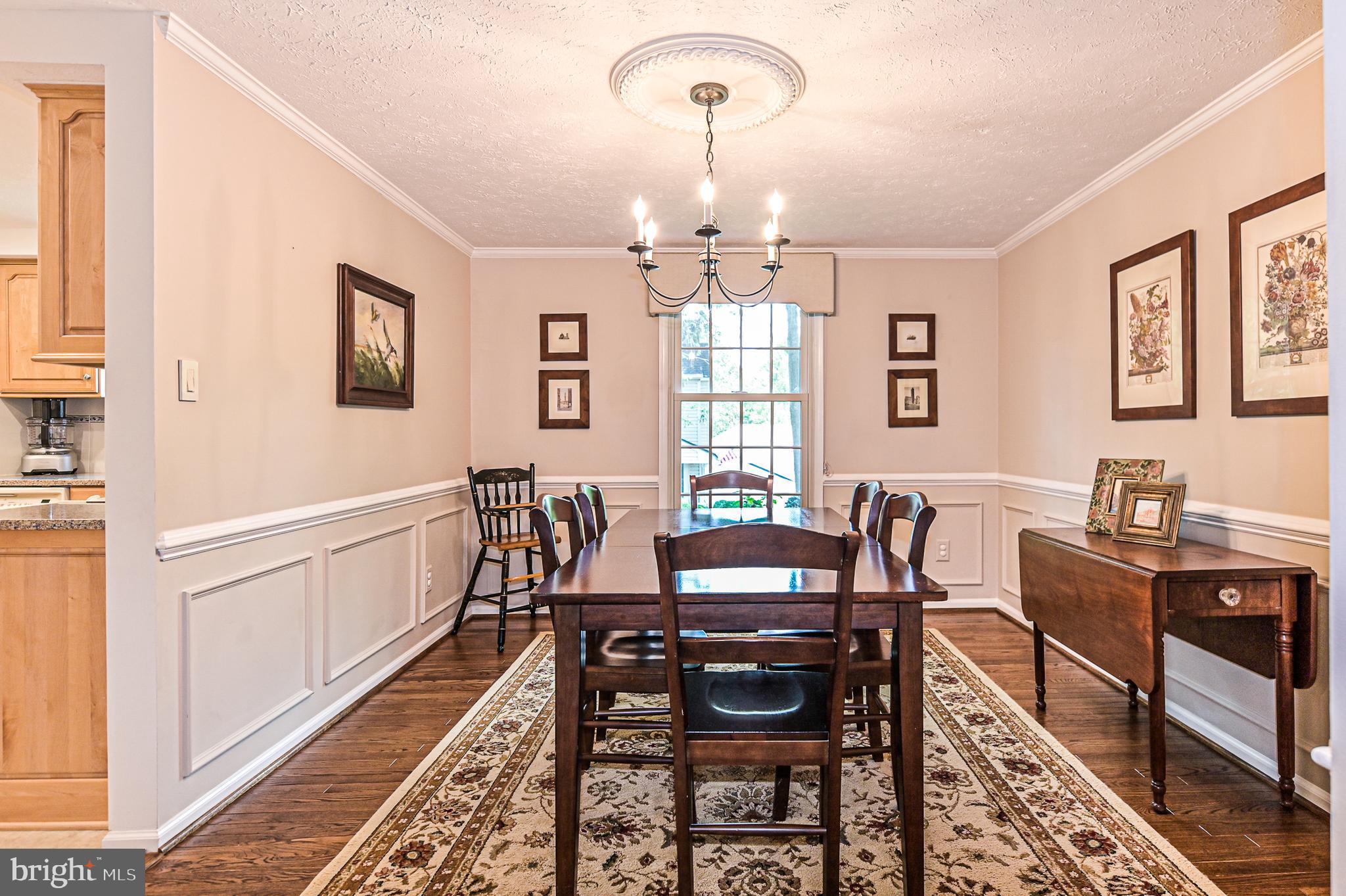 7553 Cloud Court Springfield, VA 22153 - Photo 7 of 32 Formal dining room with decorative moldings