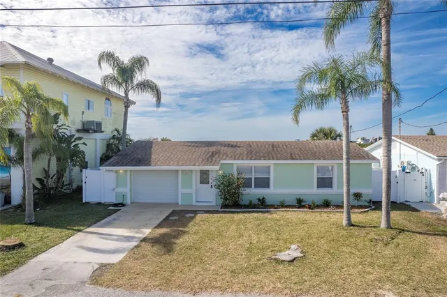 a house view with a backyard space