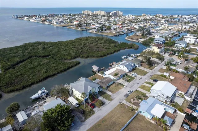 an aerial view of a city with lots of residential buildings