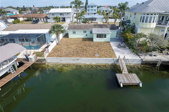 a view of a lake with sitting area