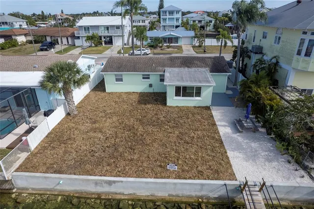 a view of a lake with a yard