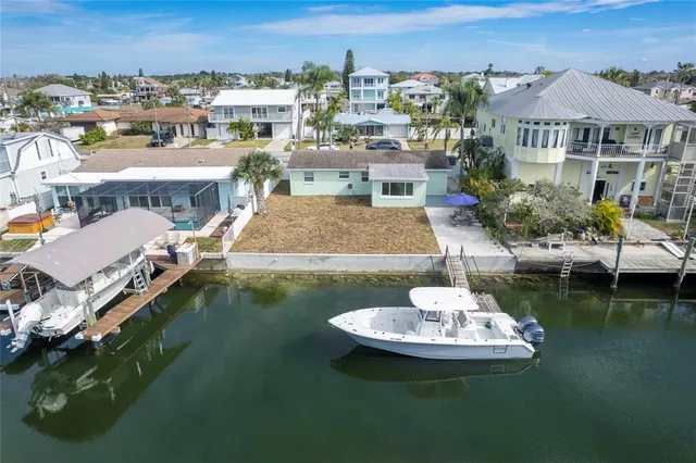 a view of houses with swimming pool