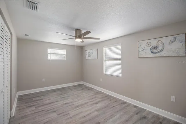 a view of empty room with large window