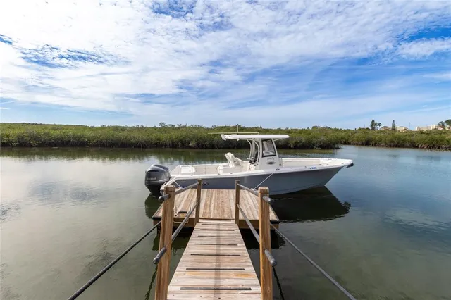 a view of a lake with sitting area