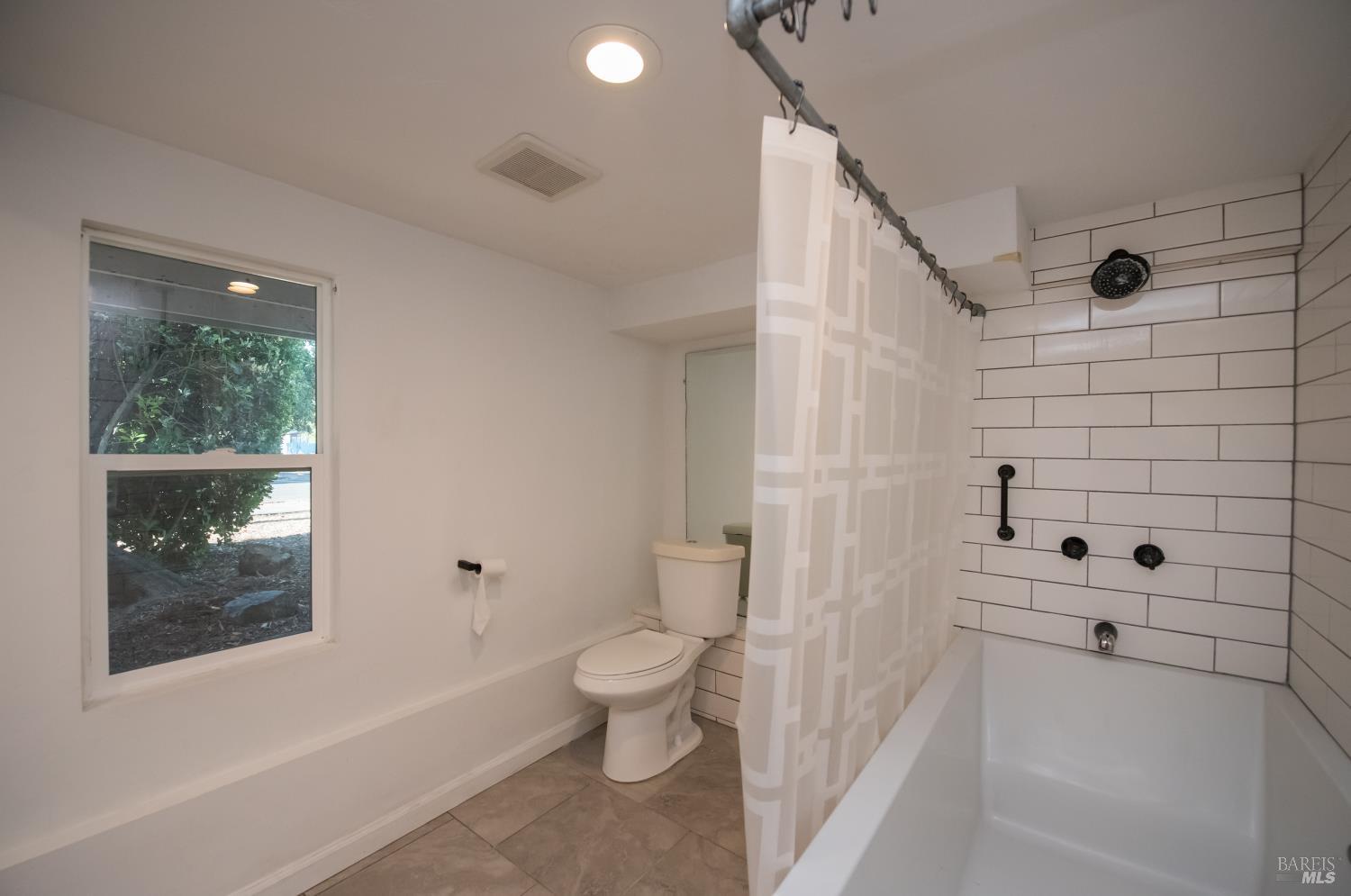300 West 8th Street Santa Rosa, CA 95401 - Photo 27 of 39 Spacious downstairs bathroom with shower over tub