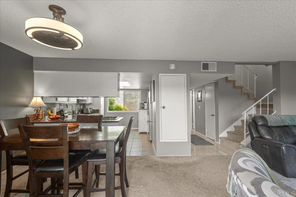 3047 Highlands Boulevard Spring Valley, CA 91977 - Photo 12 of 39 a dining room with furniture and window