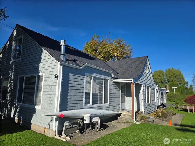 a room with furniture and wooden floor