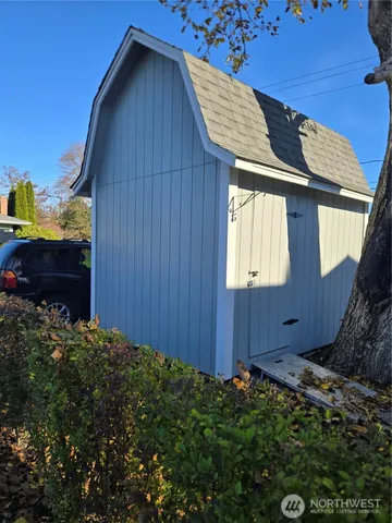 a view of a house with a fence
