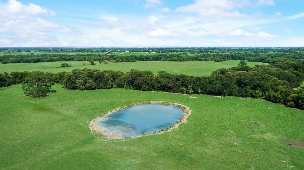 1 Co Road Kaufman, TX 75142 - Photo 3 of 7 a view of a golf course with a garden