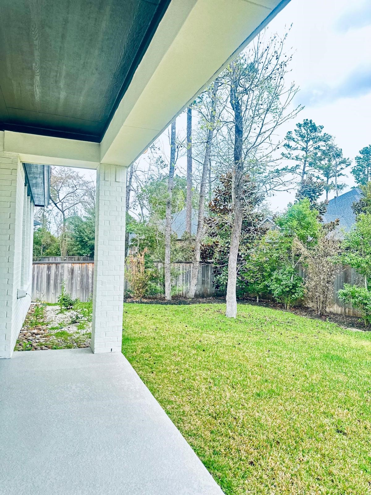 6 Gentle Branch Place Tomball, TX 77375 - Photo 44 of 46 a view of a garden with an outdoor space