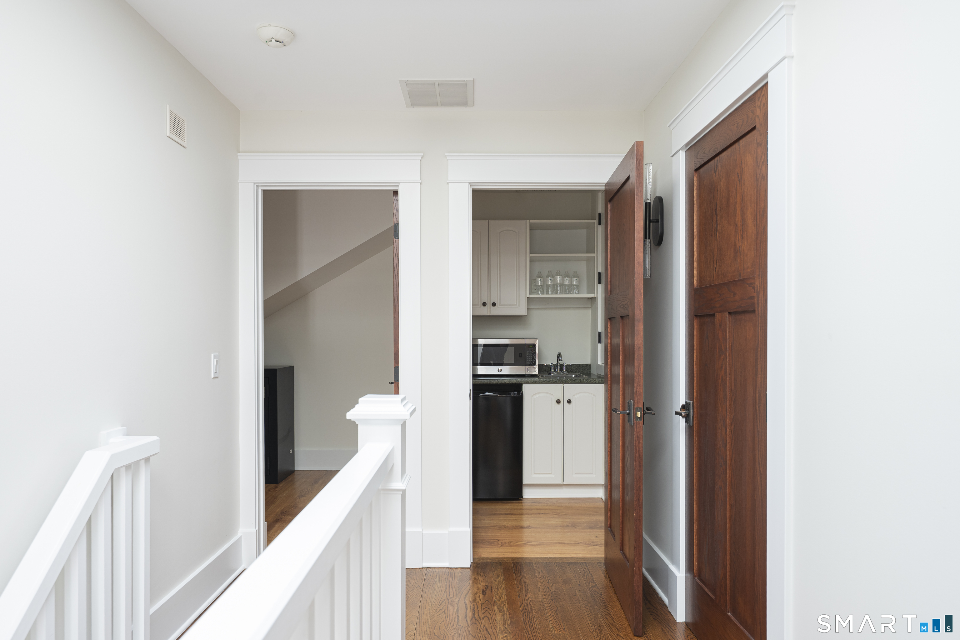 107 Parade Hill Road New Canaan, CT 06840 - Photo 17 of 28 a view of a kitchen from the hallway