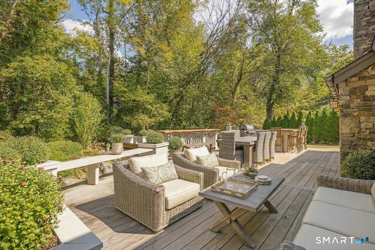 107 Parade Hill Road New Canaan, CT 06840 - Photo 24 of 28 a view of a patio with wooden floor