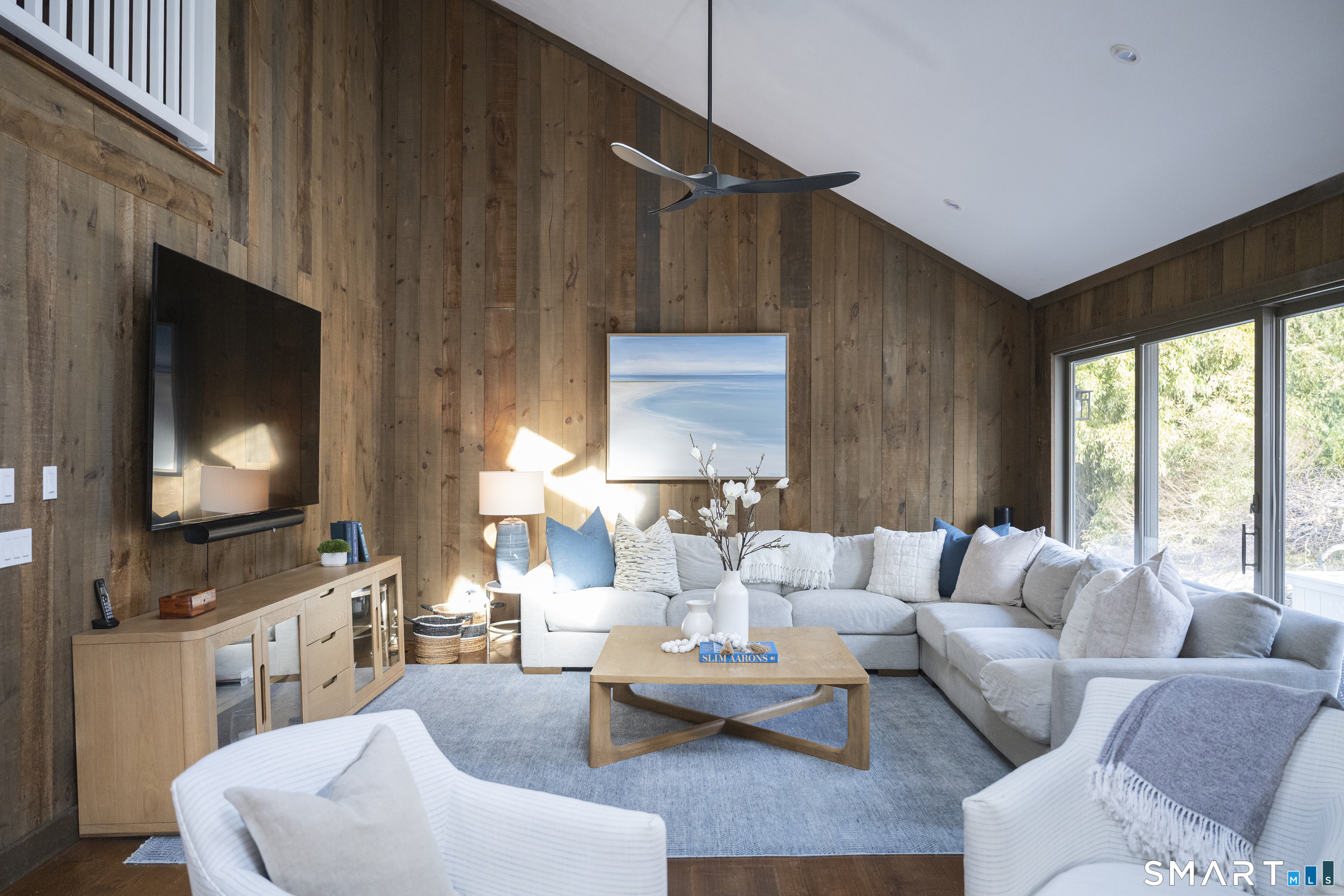 107 Parade Hill Road New Canaan, CT 06840 - Photo 4 of 28 a living room with furniture and a flat screen tv