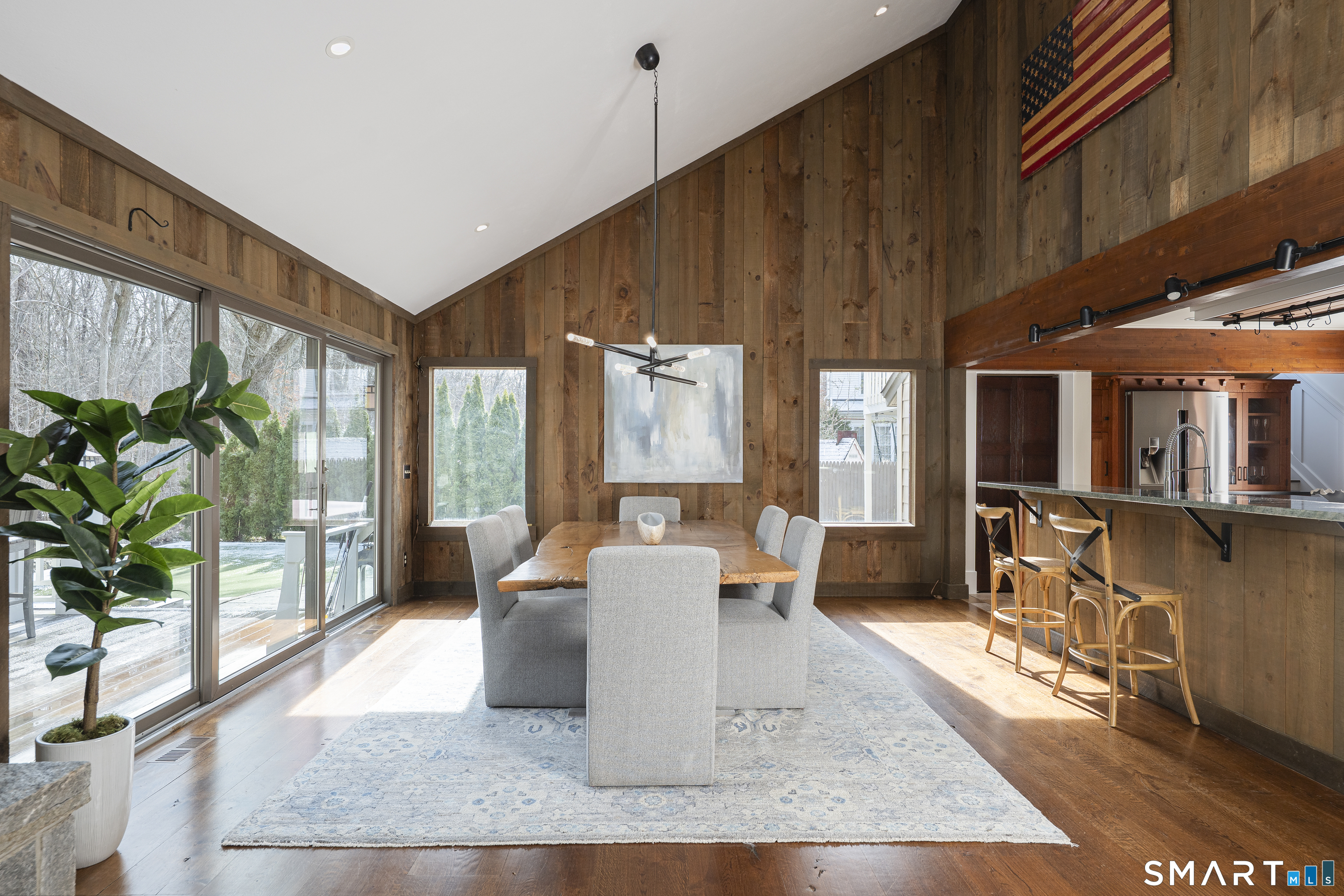 107 Parade Hill Road New Canaan, CT 06840 - Photo 6 of 28 a living room with furniture a large window and wooden floor