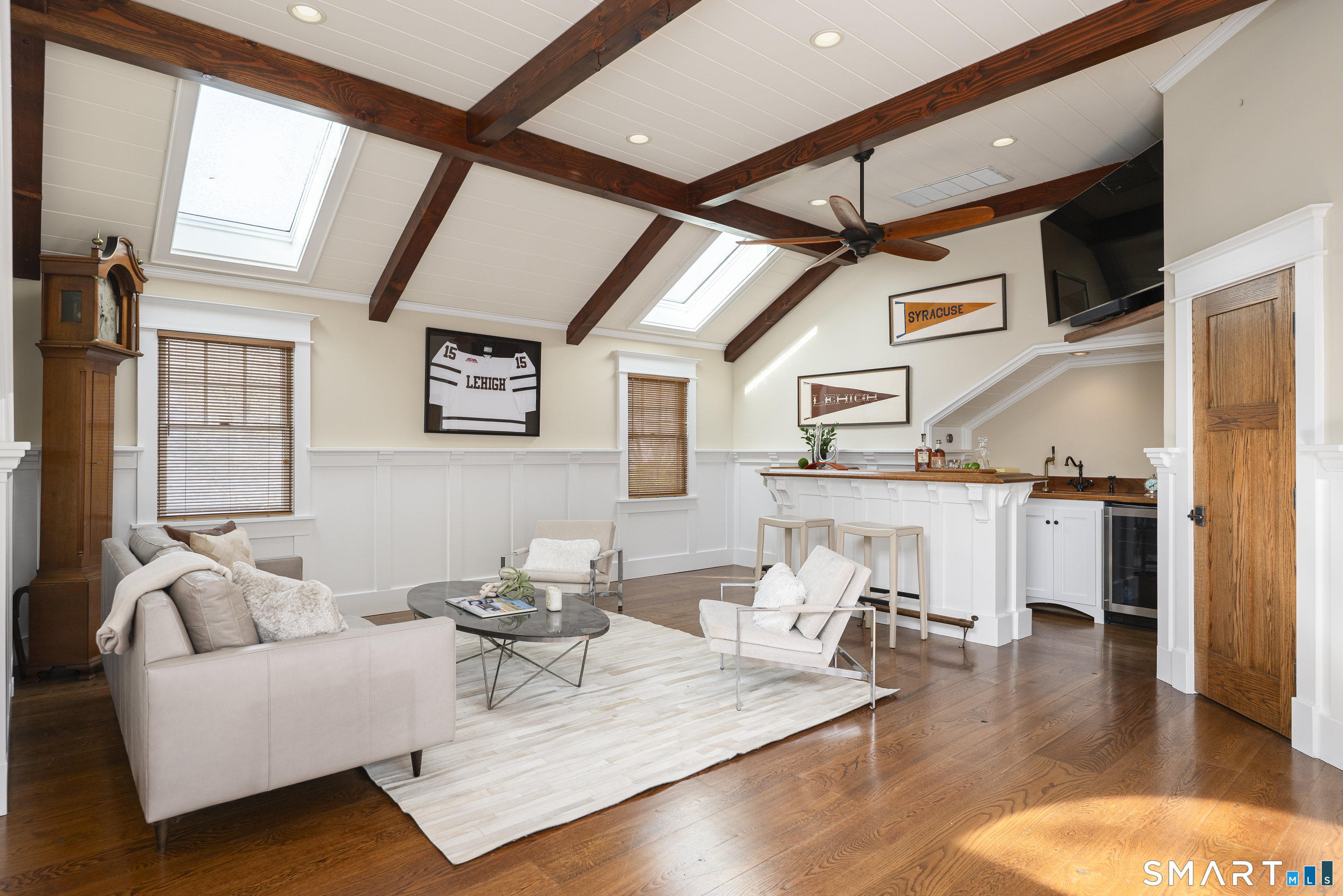 107 Parade Hill Road New Canaan, CT 06840 - Photo 9 of 28 a living room with fireplace furniture and a table