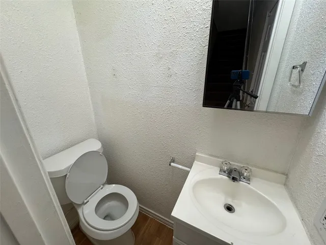 a bathroom with a sink and a toilet