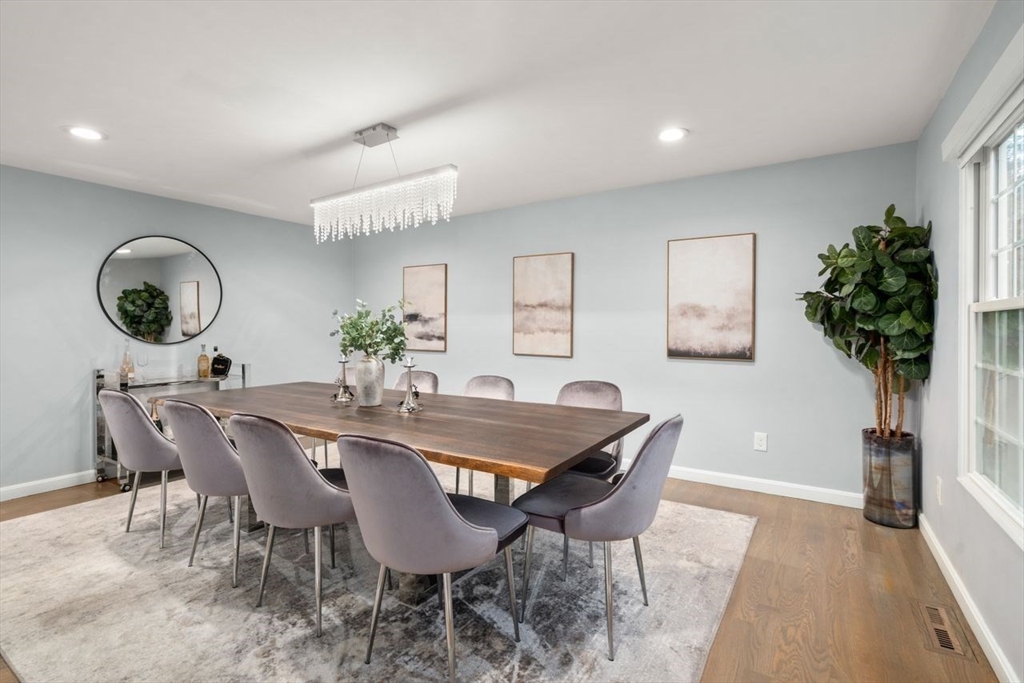 52 Condor Road Sharon, MA 02067 - Photo 13 of 36 a view of a dining room with furniture