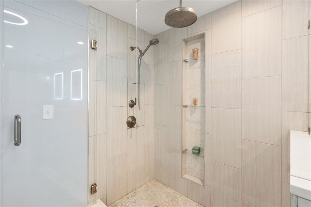 52 Condor Road Sharon, MA 02067 - Photo 20 of 36 a bathroom with a shower