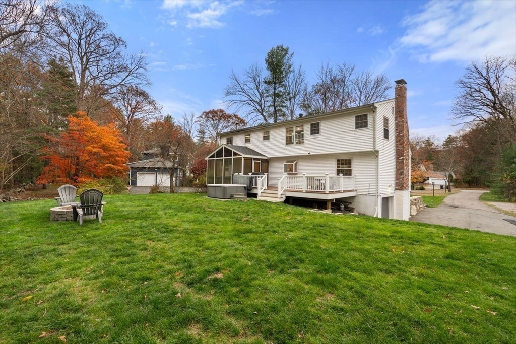 52 Condor Road Sharon, MA 02067 - Photo 27 of 36 a view of an house with backyard space and sitting area