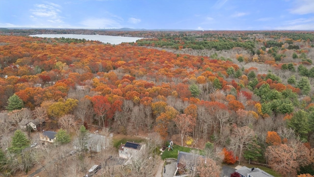 52 Condor Road Sharon, MA 02067 - Photo 34 of 36 a view of a lake from a yard