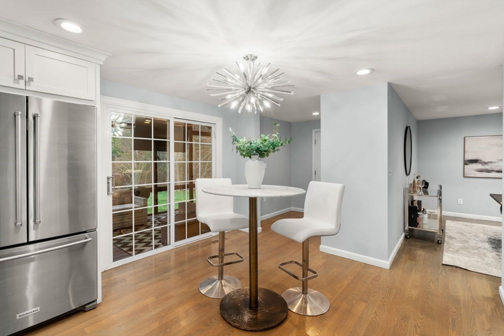 52 Condor Road Sharon, MA 02067 - Photo 6 of 36 a view of a livingroom with furniture and a potted plant
