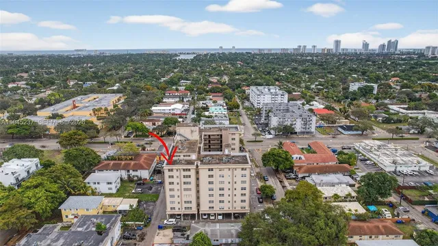 an aerial view of city and lake