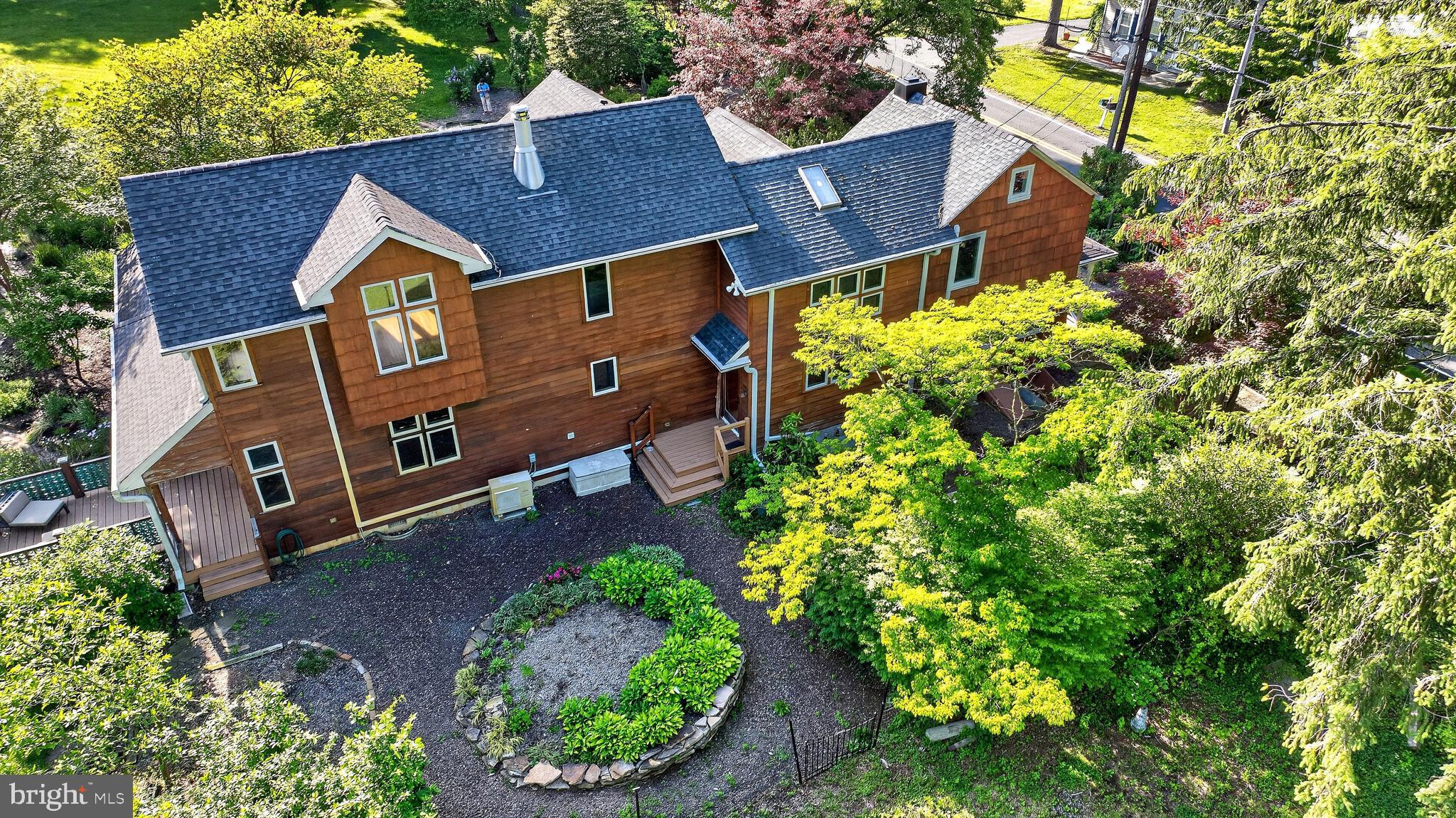 498 Perrineville Road Robbinsville, NJ 08691 - Photo 49 of 59 an aerial view of a house with a yard and garden