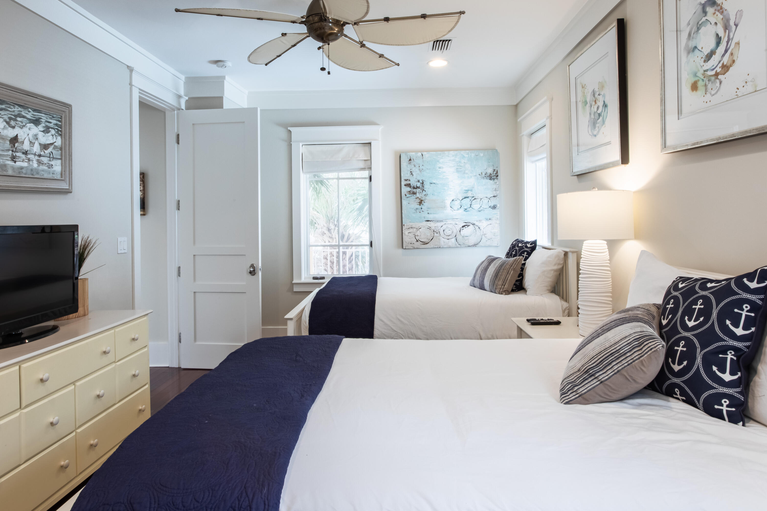 175 Rue Martine Miramar Beach, FL 32550 - Photo 16 of 23 a bedroom with furniture and a flat screen tv