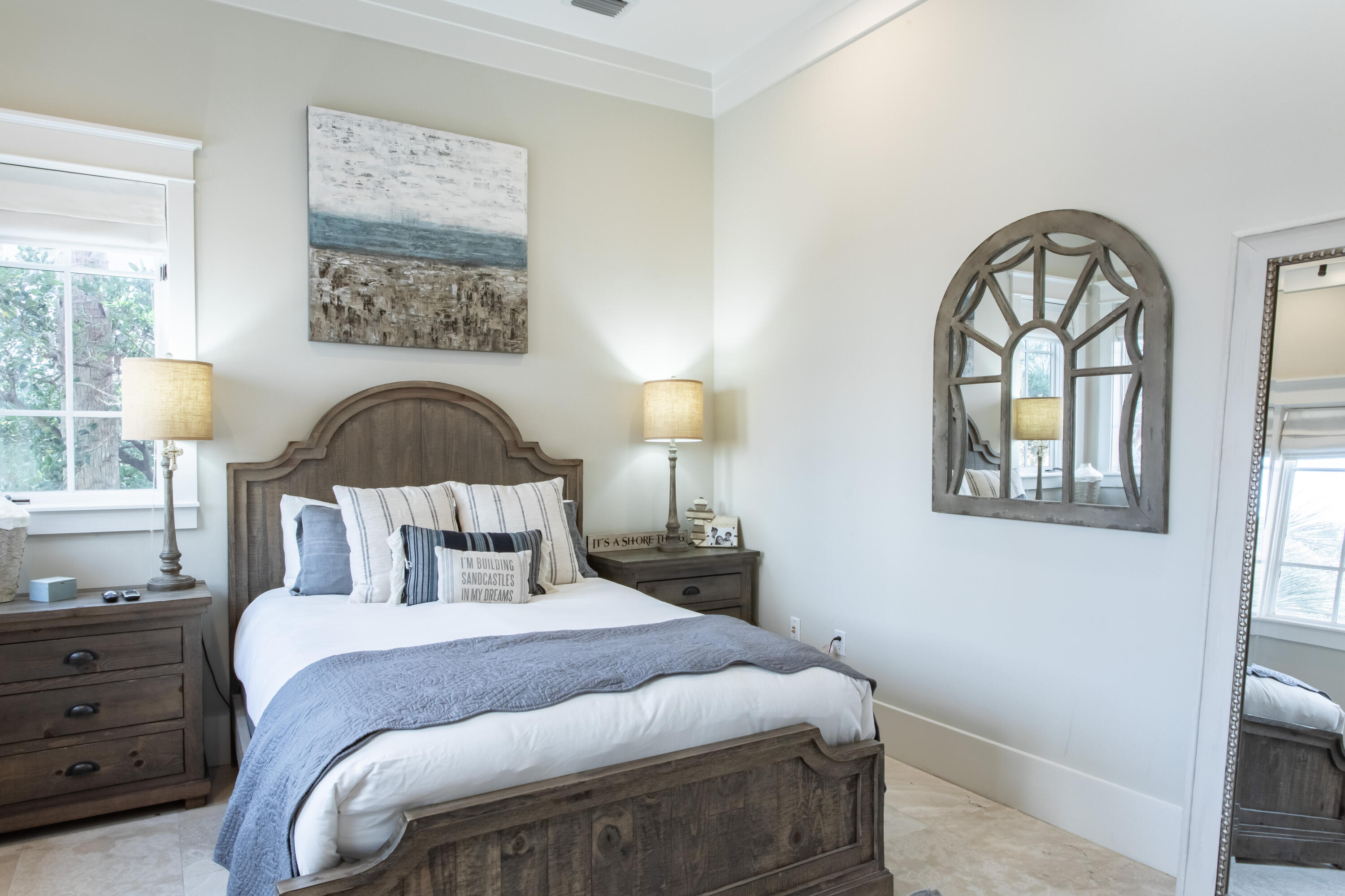 175 Rue Martine Miramar Beach, FL 32550 - Photo 7 of 23 a bedroom with a bed and a lamp on dresser