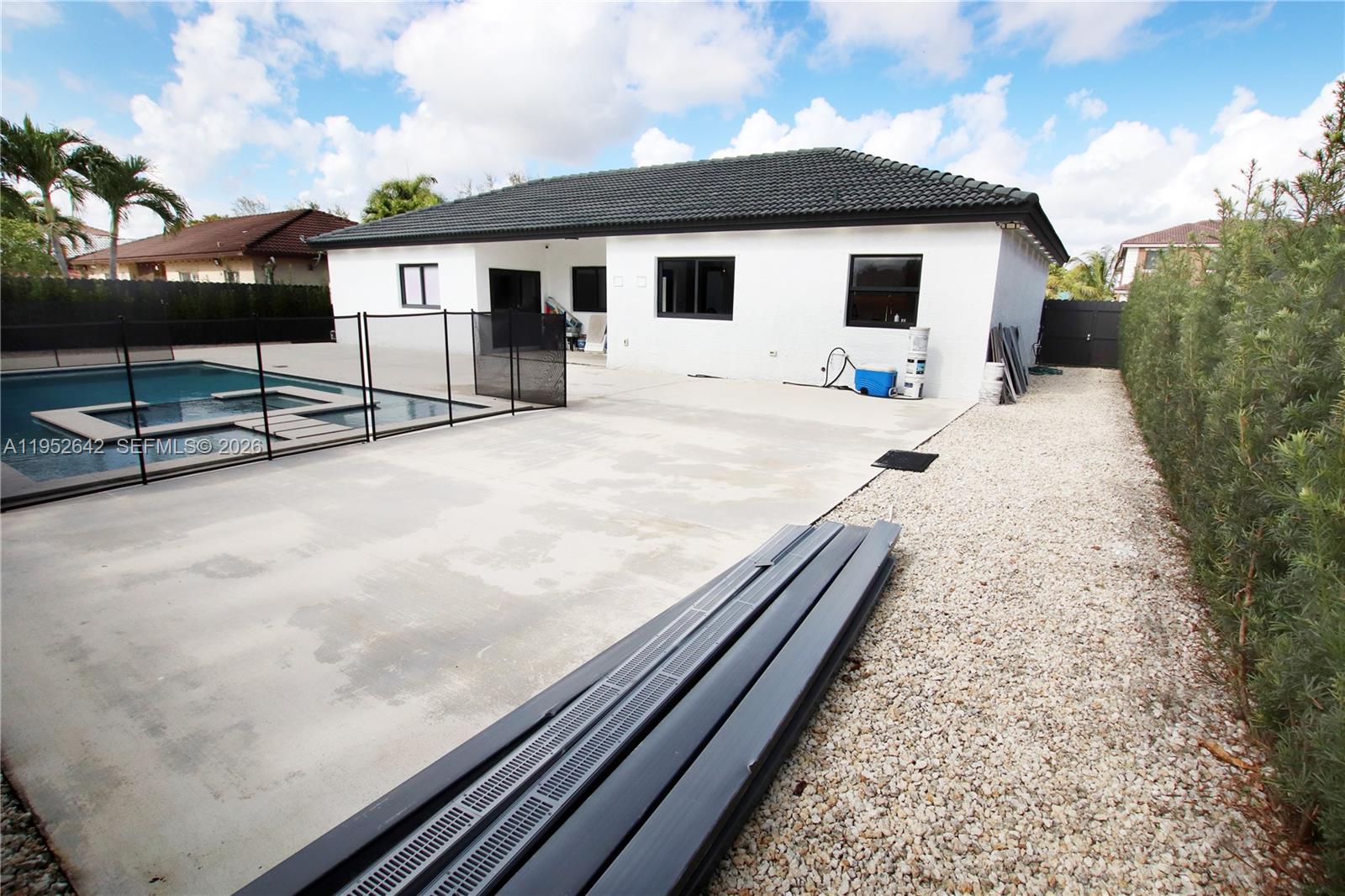 14218 Southwest 291st Street Homestead, FL 33033 - Photo 36 of 36 a view of a house with backyard and sitting area