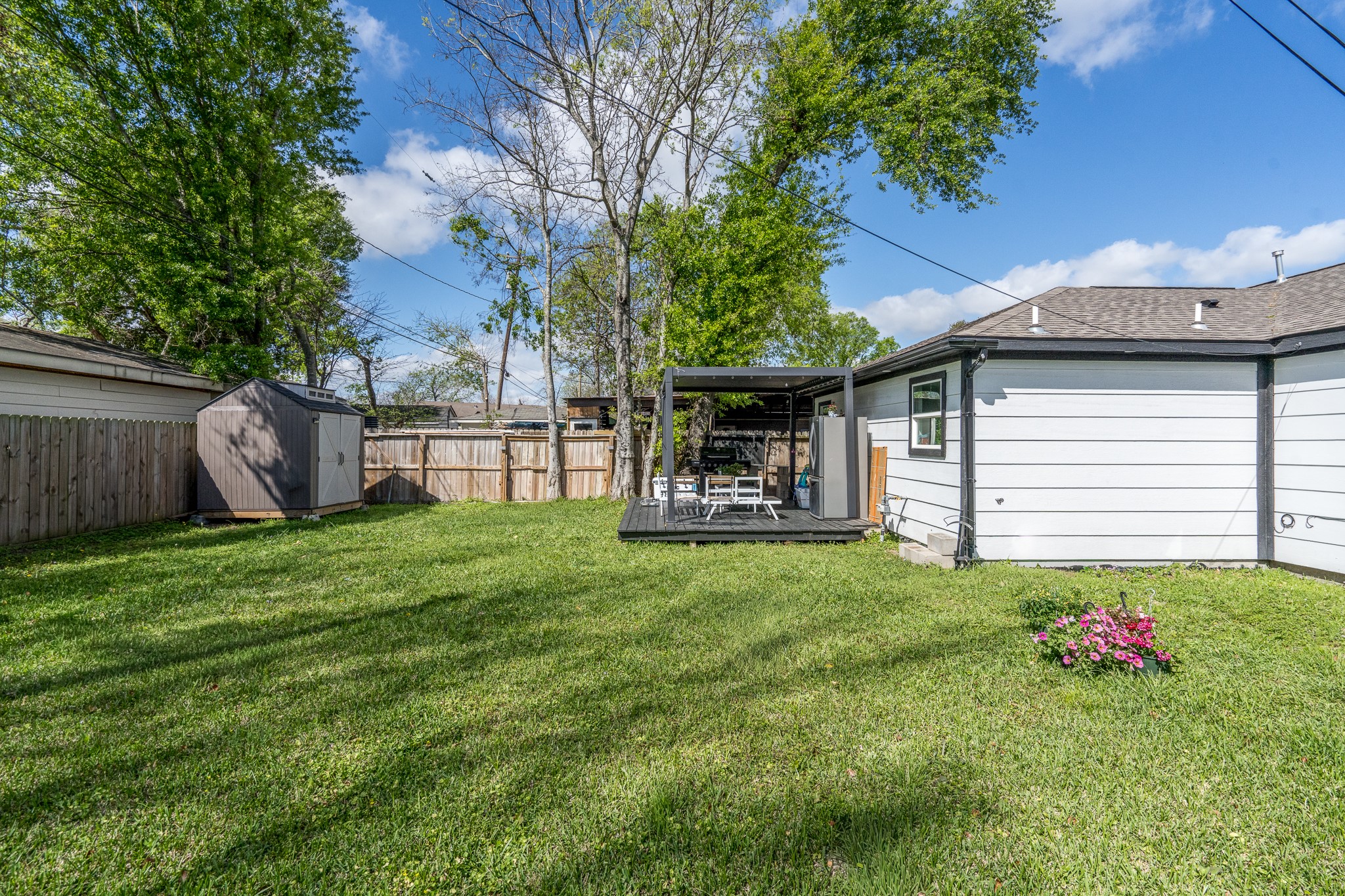 810 Jerry Street Houston, TX 77022 - Photo 20 of 20 Immense backyard with a covered patio and a storage shed. Great for entertaining or just relaxing to enjoy the outdoor space!
