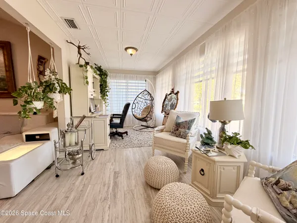 a bathroom with a sink a mirror and a shower
