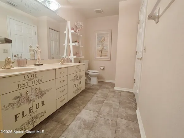 a view of a dry yard with wooden floor