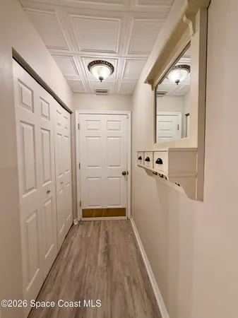 an aerial view of a house with outdoor space and lake view