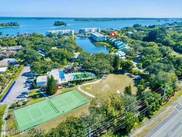 a kitchen with a sink stainless steel appliances and cabinets