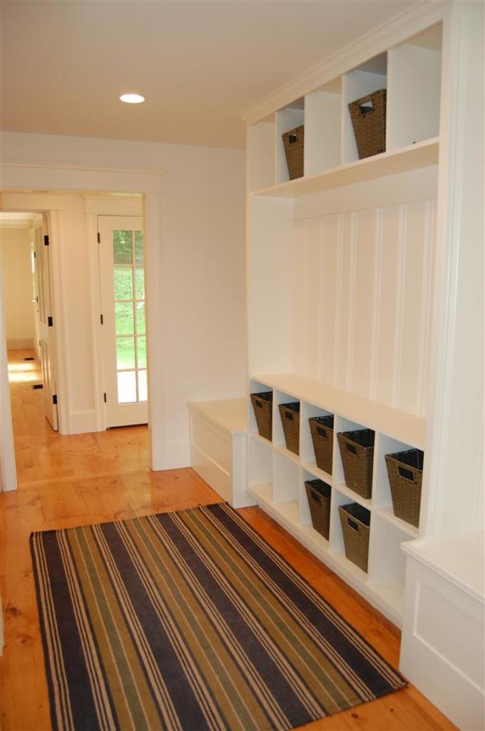 465 Stage Harbor Road Chatham, MA 02633 - Photo 11 of 17 a spacious bedroom with a bed and wooden floor