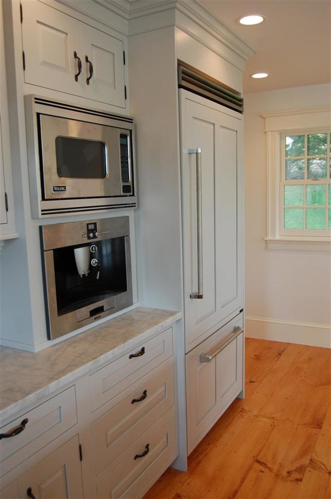 465 Stage Harbor Road Chatham, MA 02633 - Photo 14 of 17 a kitchen with granite countertop white cabinets stainless steel appliances and sink