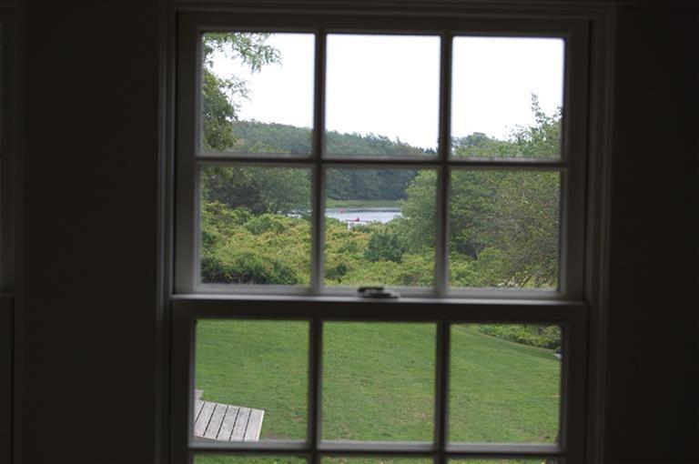 465 Stage Harbor Road Chatham, MA 02633 - Photo 15 of 17 a view of a room with a large window