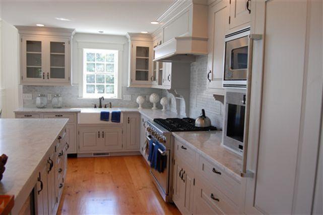 465 Stage Harbor Road Chatham, MA 02633 - Photo 10 of 17 a kitchen with stainless steel appliances granite countertop a sink stove and refrigerator